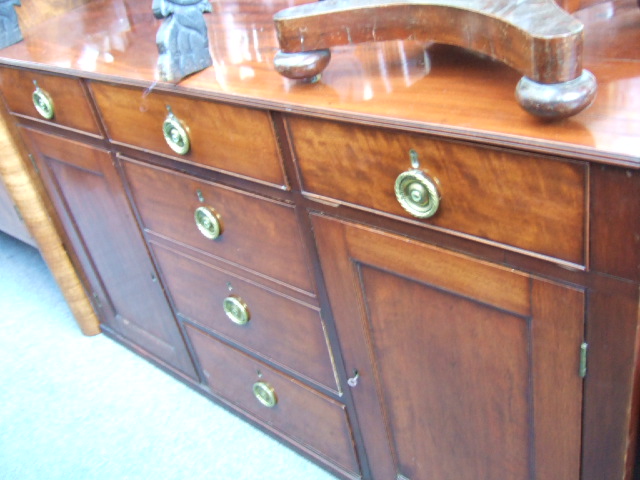 Appraisal: An early th century mahogany sideboard with a reeded edge