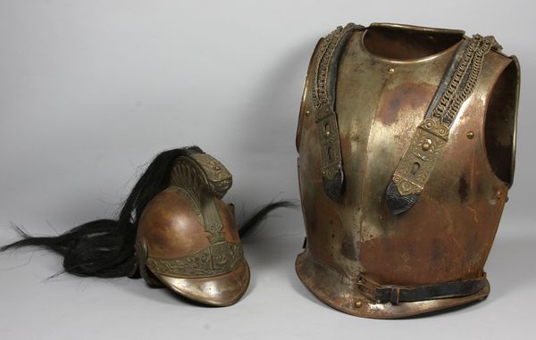 Appraisal: th Century French ceremonial dragoon helmet and cuirass including one