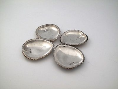 Appraisal: A set of four Victorian silver counter dishes by A