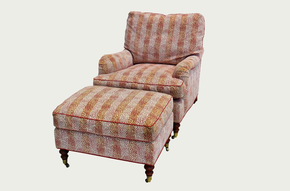 Appraisal: CONTEMPORARY TRADITIONAL CLUB CHAIR AND OTTOMANBy repute George Smith NY