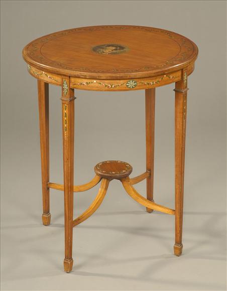 Appraisal: A late Victorian painted satinwood circular occasional table in Sheraton