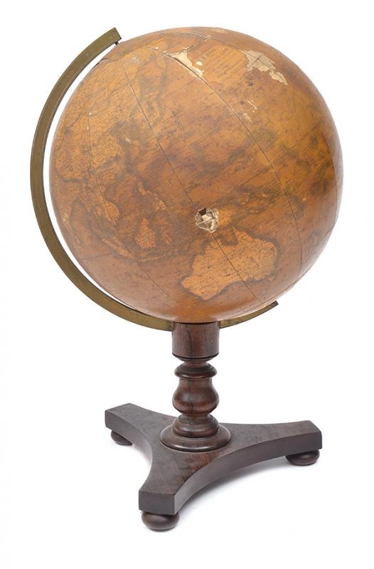 Appraisal: A NEWTON'S TERRESTRIAL GLOBE housed within a semi circular brass