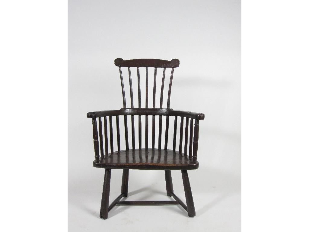 Appraisal: A primitive stick back Elbow Chair on tapering turned supports