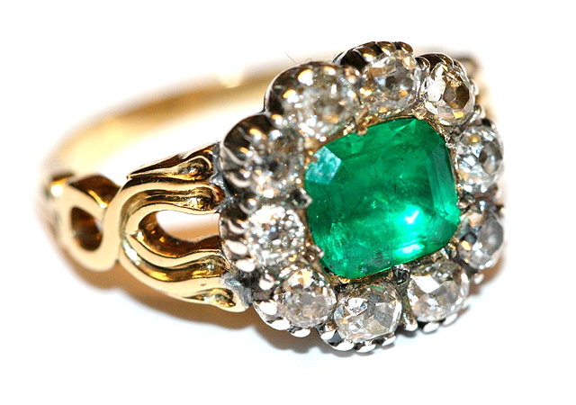 Appraisal: A VICTORIAN EMERALD AND DIAMOND SET DRESS RING emerald cut