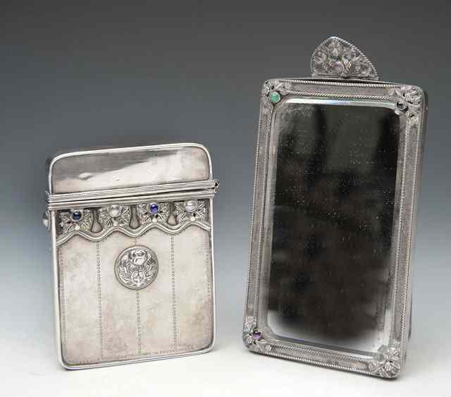 Appraisal: AN ORIENTAL WHITE METAL CIGARETTE OR CARD CASE with applied