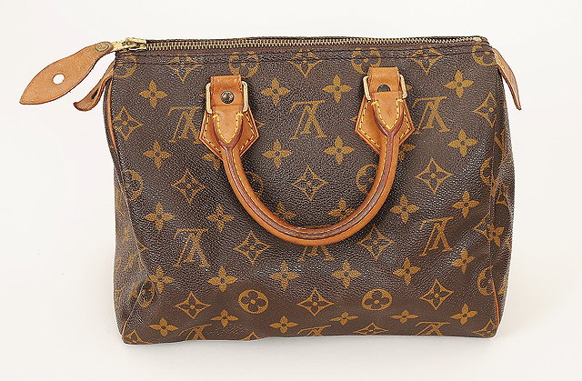 Appraisal: A Louis Vuitton Speedy bag LV monogram with tan leather