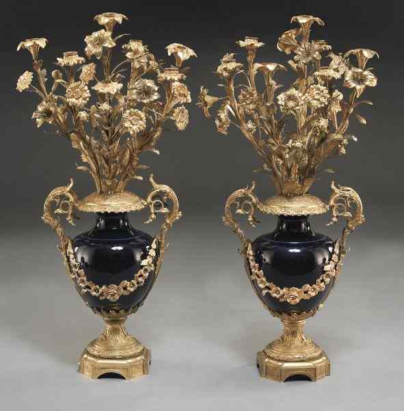 Appraisal: Pr Sevres style cobalt urns with bronze mounts each urn