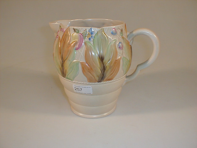 Appraisal: A Clarice Cliff jug with hand painted relief moulded floral