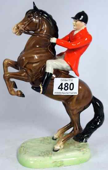 Appraisal: Beswick Huntsman on rearing horse