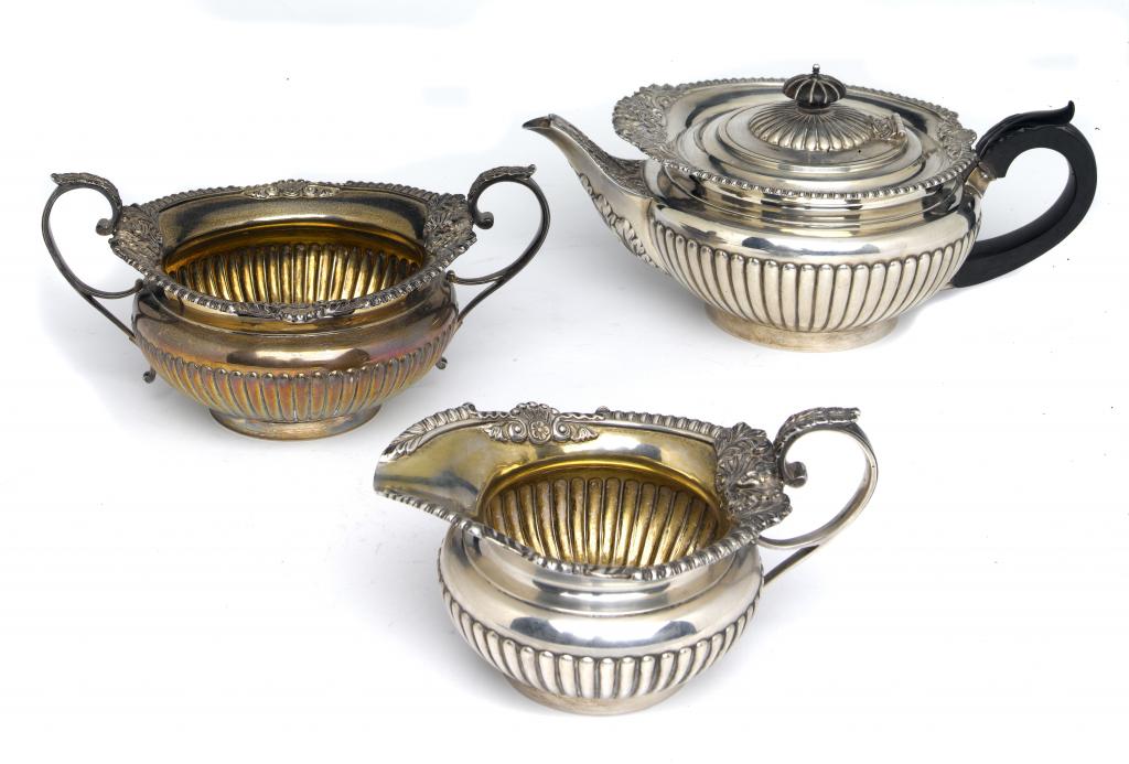 Appraisal: A GEORGE V TEA SERVICE in Regency style of partly