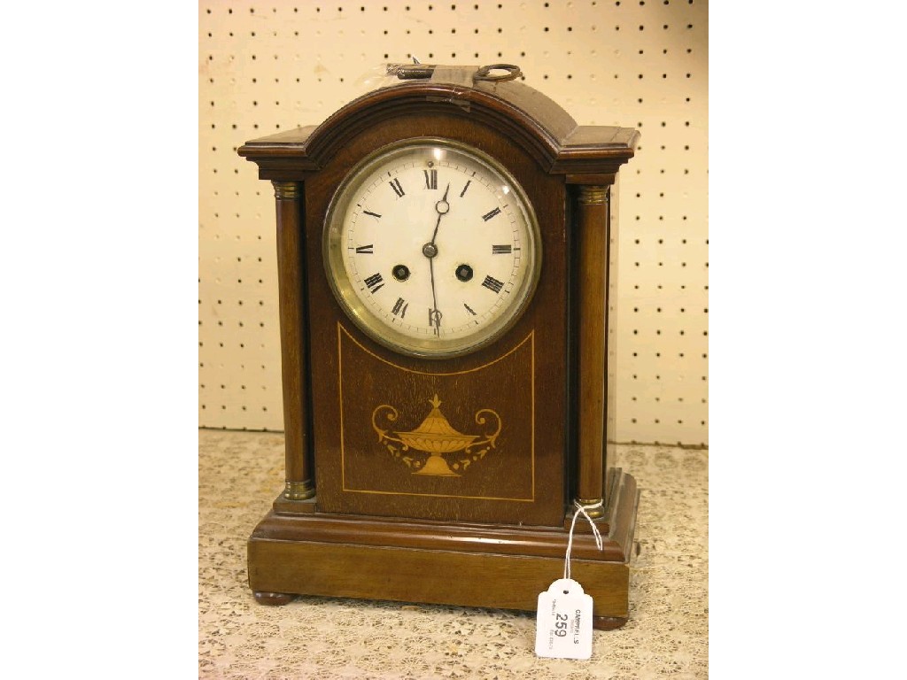 Appraisal: An Edwardian inlaid mahogany mantel clock with convex enamel dial