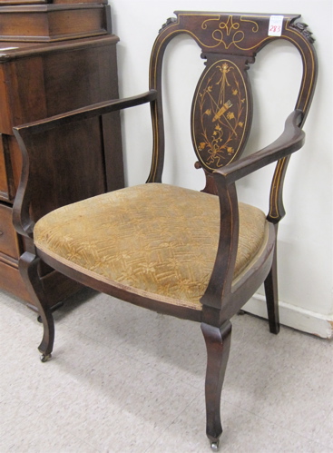 Appraisal: AN INLAID MAHOGANY ARMCHAIR American c featuring an inlaid medallion