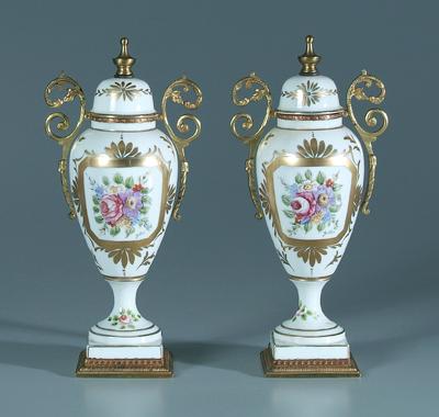 Appraisal: Pair French porcelain urns hand painted floral decoration with gilt