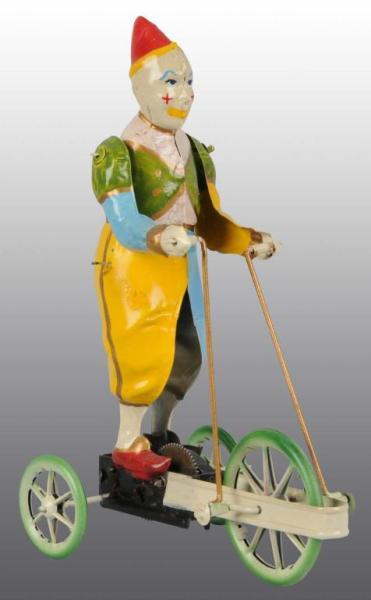 Appraisal: Tin Hand-Painted Clown Wind-Up Toy Description German Working When wound