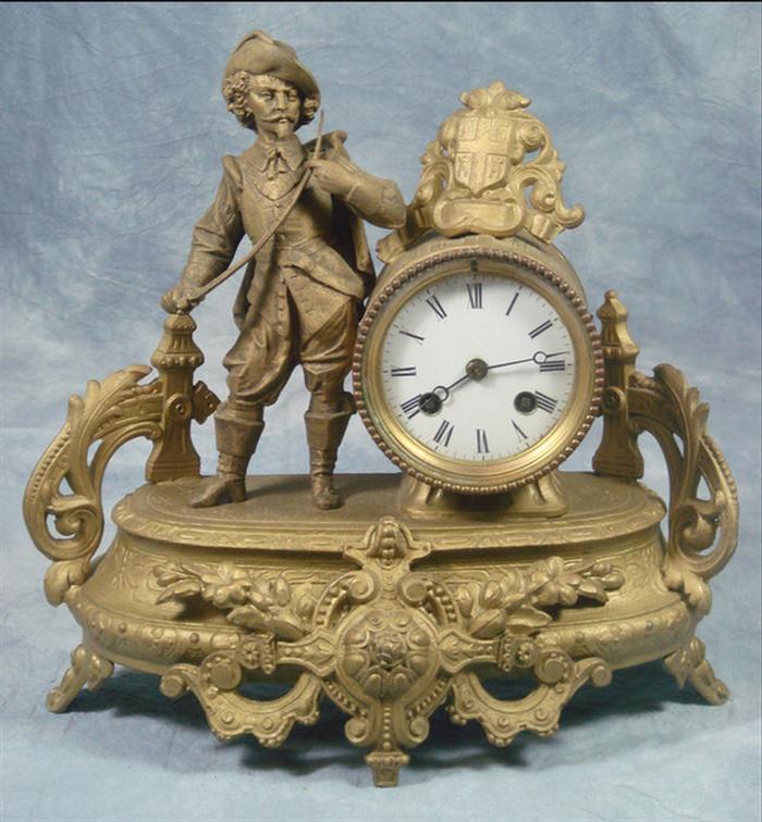 Appraisal: French white metal figural clock gold painted finish porcelain dial