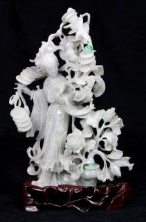 Appraisal: Chinese Jadeite Sculpture Chinese jadeite sculpture a celestial beauty holding