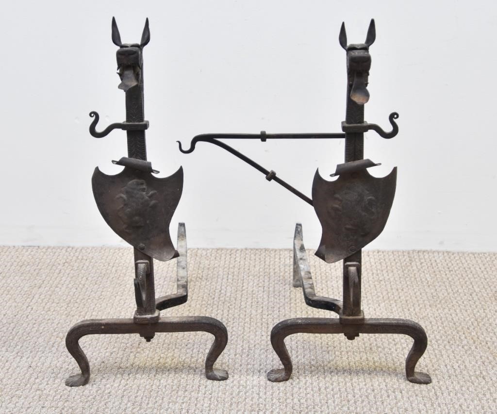 Appraisal: Large pair of wrought iron dragon form andirons early th