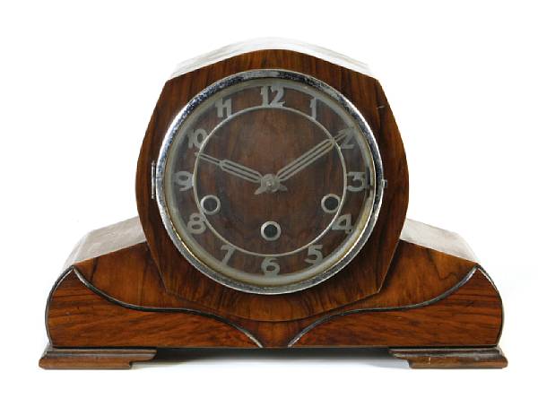 Appraisal: An English Art Deco mahogany and rosewood mantel clock s