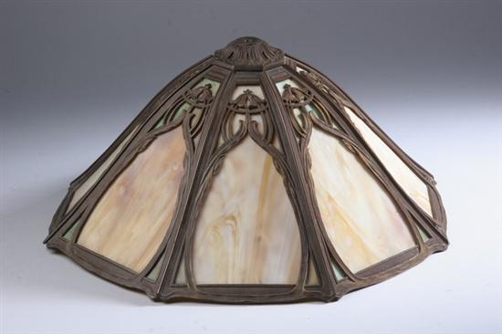 Appraisal: ART NOUVEAU BRONZE AND SLAG GLASS LAMPSHADE late th century