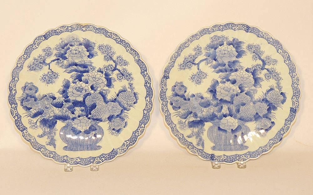 Appraisal: Pair of Chinese Porcelain Chargers Scalloped edges with blue and