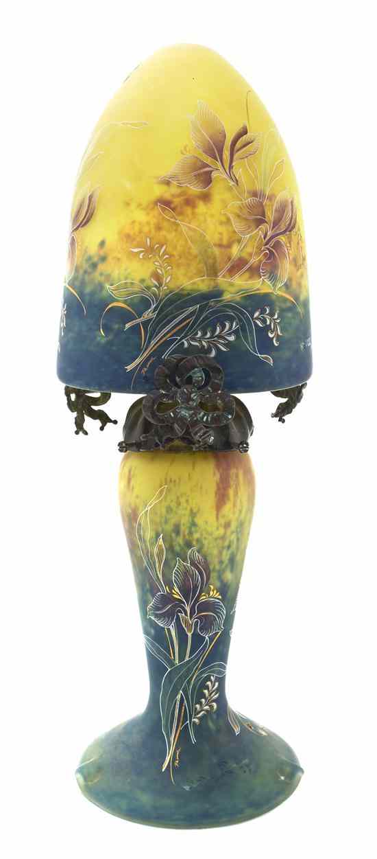 Appraisal: A French Enameled Mottled Glass Boudoir Lamp having a domed