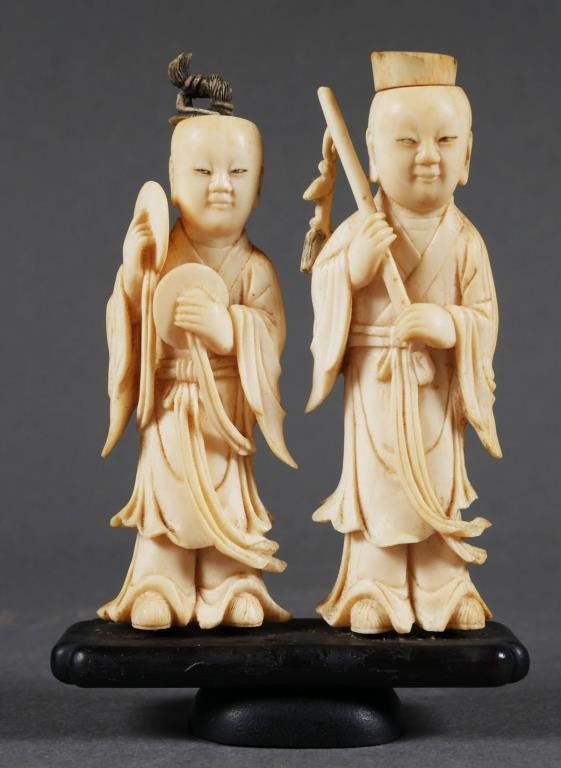 Appraisal: Pair of Chinese Snuff Figures on wooden base measures inches