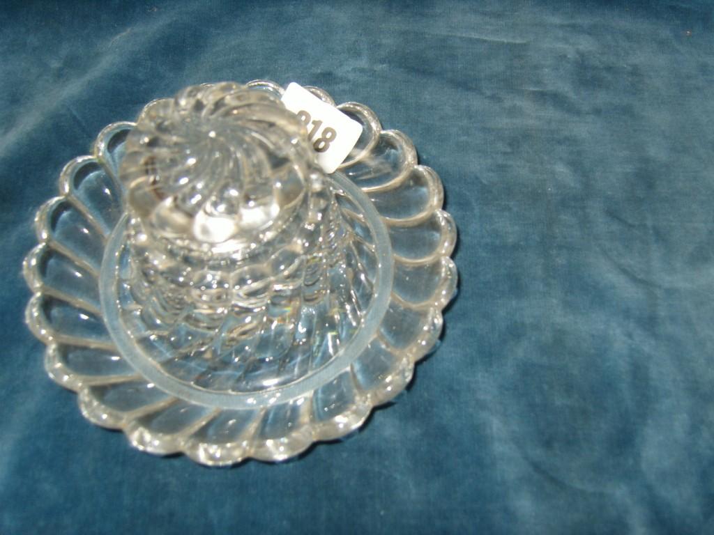 Appraisal: A clear glass inkwell of circular fluted form with moulded