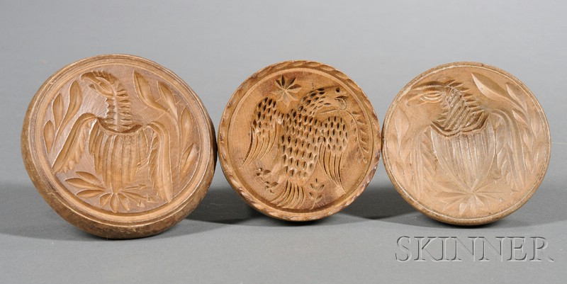 Appraisal: Three Wooden Butter Stamps America th century all depicting eagles