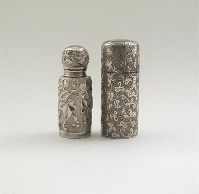 Appraisal: An embossed Victorian tubular scent with ivy leaf decoration hinged