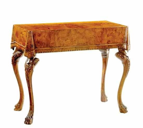 Appraisal: Mexican carved burl walnut skirt-top table rectangular top with overhanging