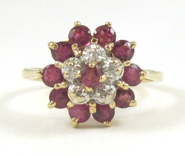 Appraisal: RUBY DIAMOND AND FOURTEEN KARAT GOLD RING set with eleven