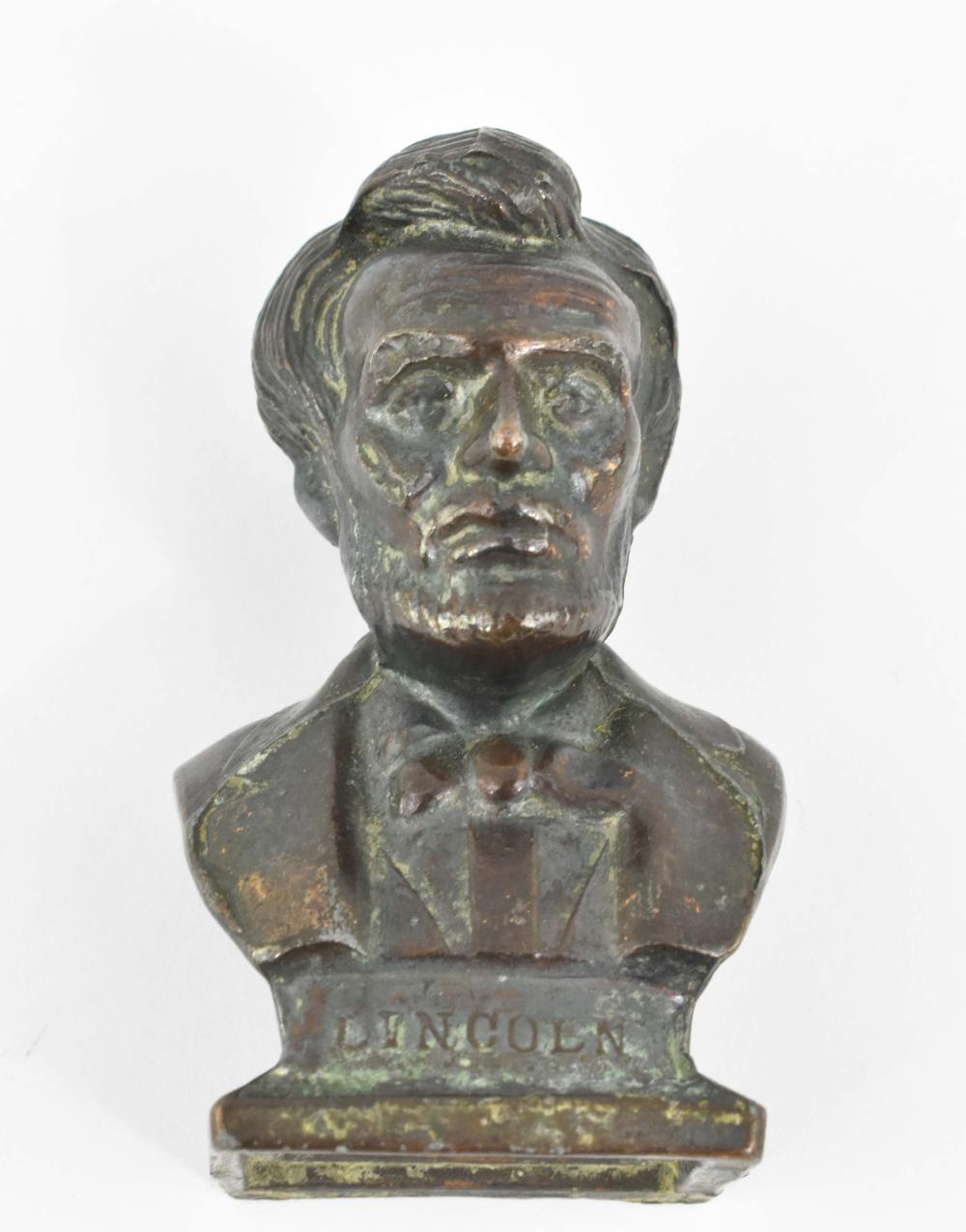 Appraisal: SMALL PATINATED METAL BUST OF ABRAHAM LINCOLN th Century Depicted