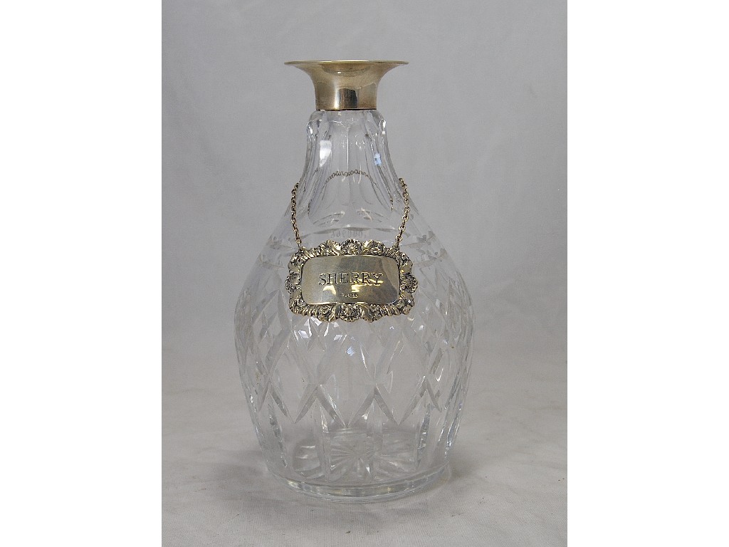 Appraisal: Cut glass decanter with plain silver ring and sherry bottle