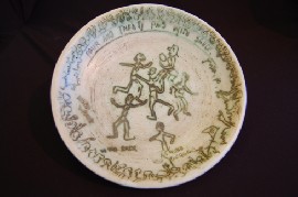 Appraisal: TOM SAUNDERS SGRAFFITO DECORATED FOOTBALL PLATE