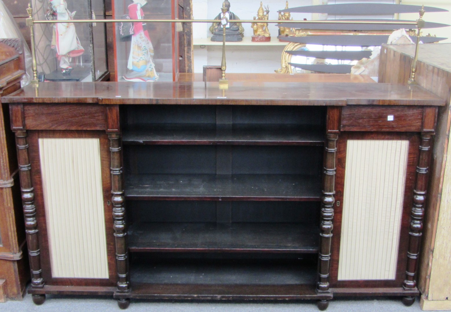 Appraisal: A William IV brass inlaid rosewood breakfront side cabinet with