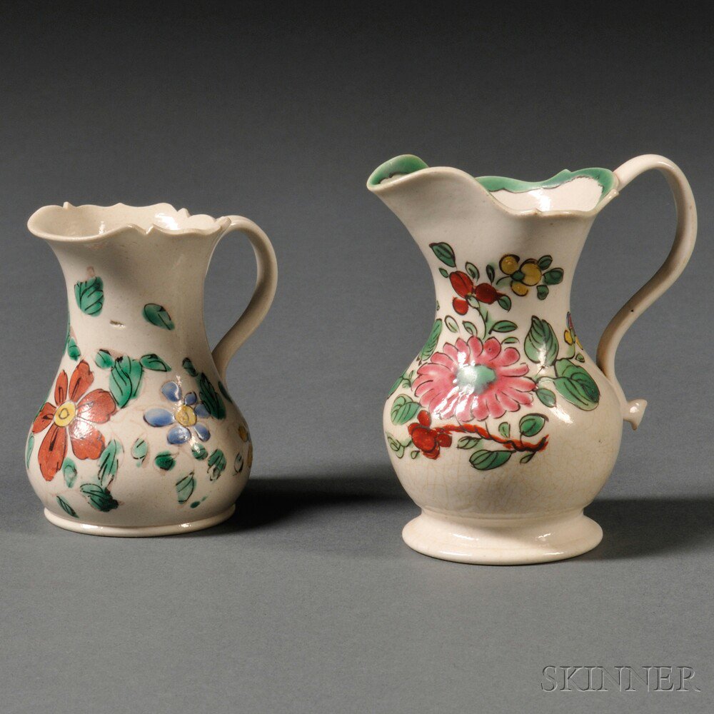 Appraisal: Two Staffordshire Enameled Salt-glazed Stoneware Cream Jugs England c each