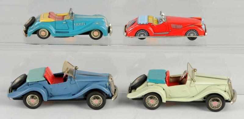 Appraisal: Lot of Tin MG Automobile Friction Toys Description Japanese Working