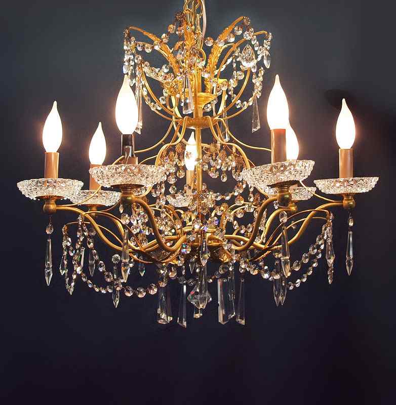 Appraisal: FINE CRYSTAL GILT CHANDELIER Seven light faceted glass bobeches Approx