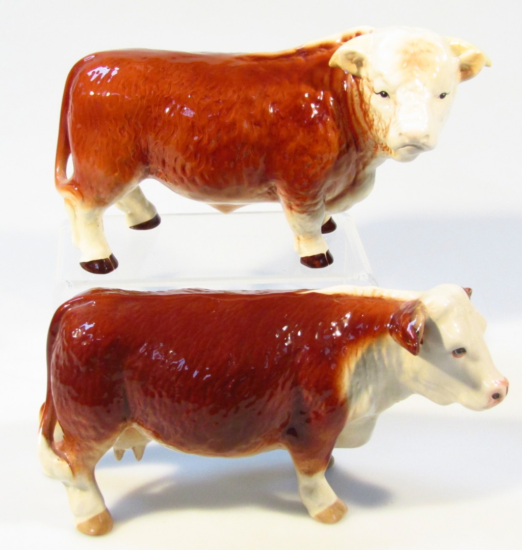 Appraisal: A thC Melba ware pottery figure of a Hereford bull