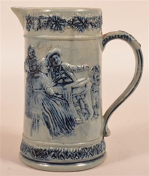 Appraisal: Stoneware Pitcher with Embossed Pub Scenes Embossed Decorated Stoneware Pitcher