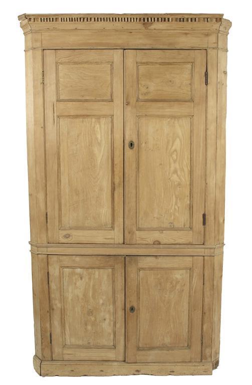 Appraisal: A th century pine standing corner cupboard