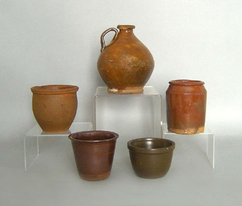 Appraisal: Four redware crocks together with a jug th c tallest