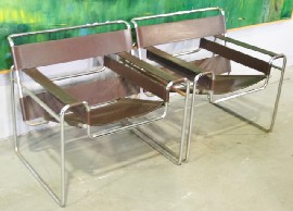 Appraisal: Two armchairs in the Marcel Breuer style