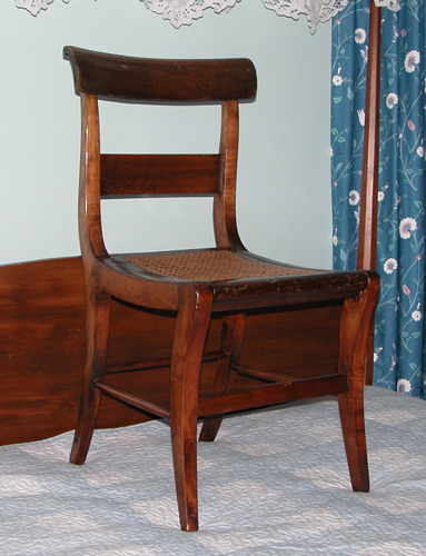 Appraisal: Pair of American Saber Leg Chairs one caned one upholstered