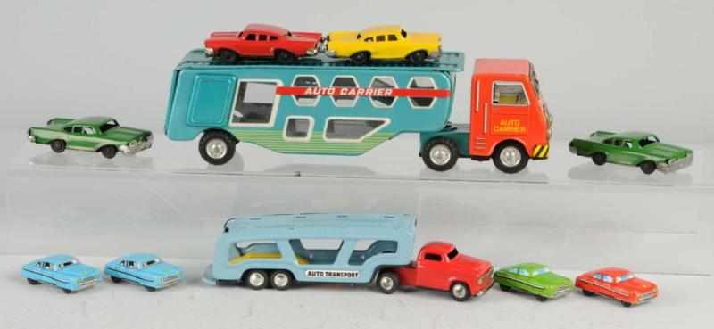 Appraisal: Lot of Tin Car Carrier Friction Toys Description Japanese Working