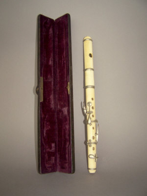 Appraisal: An ivory flute th century Fitted with silver plated mounts