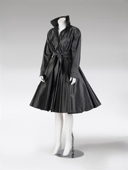 Appraisal: Gianfranco Ferre gunmetal silk trench coat s With exaggerated crinoline-supported