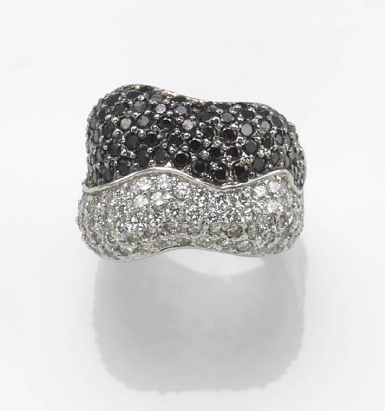 Appraisal: A diamond black diamond and k white gold ring estimated