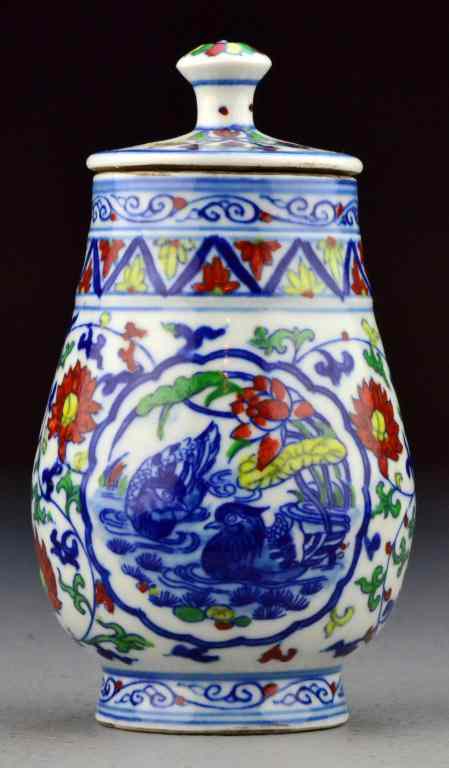 Appraisal: Chinese Wu Cai Porcelain Covered JarFinely painted to depict birds