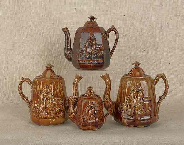 Appraisal: Four Rockingham glaze Rebekah at the Well teapots th c